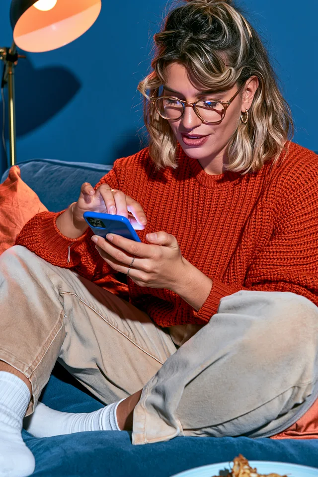 Customer choosing food on her phone.
